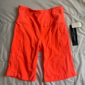 orange biker shorts size S has pockets on the sides